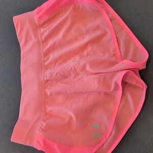 Never worn bright pink under armour running shorts sz small